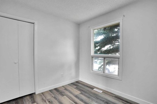 55 Falton Close Ne, Calgary, AB - Indoor Photo Showing Other Room
