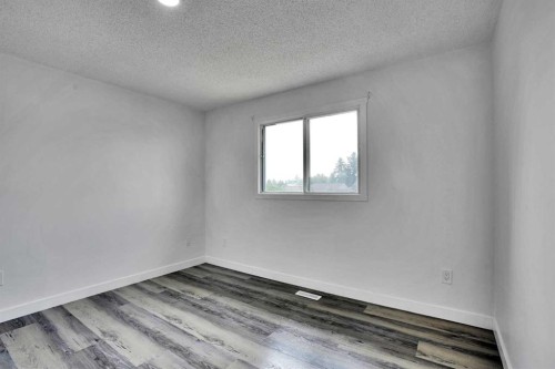 55 Falton Close Ne, Calgary, AB - Indoor Photo Showing Other Room