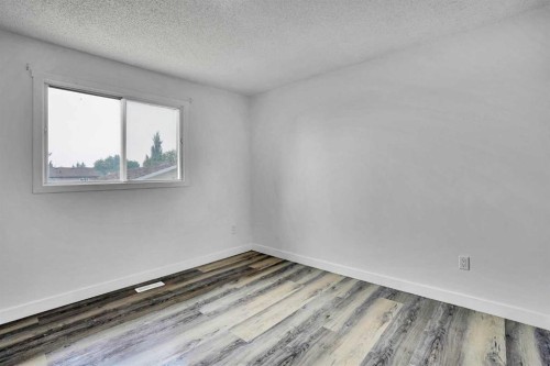 55 Falton Close Ne, Calgary, AB - Indoor Photo Showing Other Room