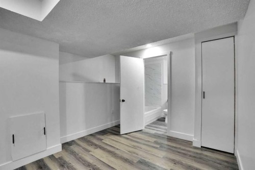 55 Falton Close Ne, Calgary, AB - Indoor Photo Showing Other Room