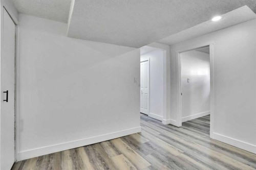 55 Falton Close Ne, Calgary, AB - Indoor Photo Showing Other Room