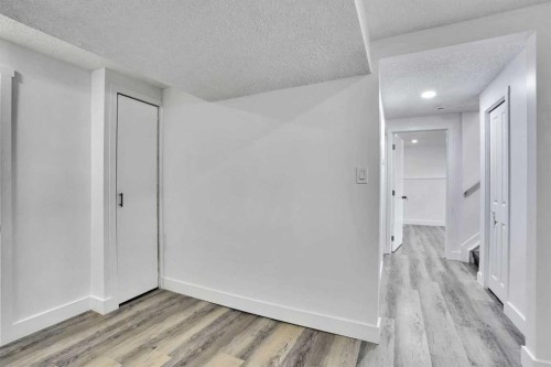 55 Falton Close Ne, Calgary, AB - Indoor Photo Showing Other Room