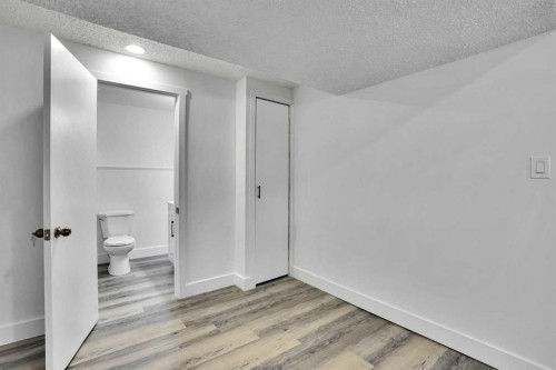 55 Falton Close Ne, Calgary, AB - Indoor Photo Showing Other Room