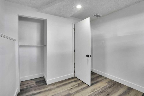 55 Falton Close Ne, Calgary, AB - Indoor Photo Showing Other Room