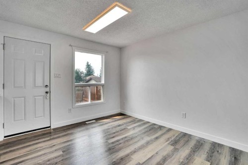 55 Falton Close Ne, Calgary, AB - Indoor Photo Showing Other Room