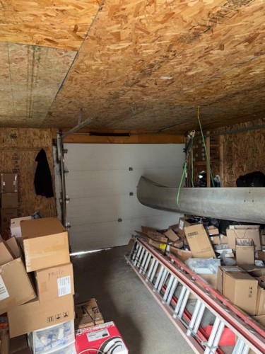 434 Millrise Drive Sw, Calgary, AB - Indoor Photo Showing Garage
