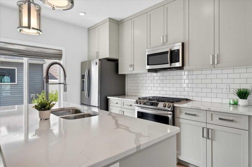 14945 1 Street Nw, Calgary, AB - Indoor Photo Showing Kitchen With Double Sink With Upgraded Kitchen