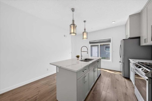 14945 1 Street Nw, Calgary, AB - Indoor Photo Showing Kitchen With Double Sink With Upgraded Kitchen