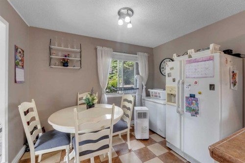 112 Penmeadows Close Se, Calgary, AB - Indoor Photo Showing Dining Room