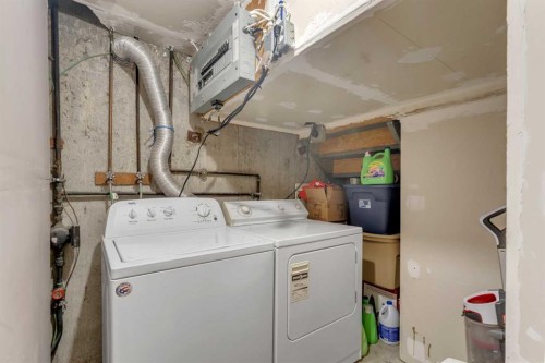 112 Penmeadows Close Se, Calgary, AB - Indoor Photo Showing Laundry Room