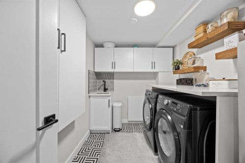 67 Hollyburn Road Sw, Calgary, AB - Indoor Photo Showing Laundry Room
