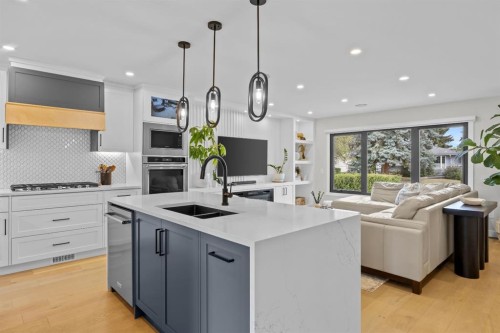67 Hollyburn Road Sw, Calgary, AB - Indoor Photo Showing Kitchen With Double Sink With Upgraded Kitchen