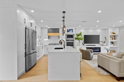 67 Hollyburn Road Sw, Calgary, AB - Indoor Photo Showing Kitchen With Upgraded Kitchen