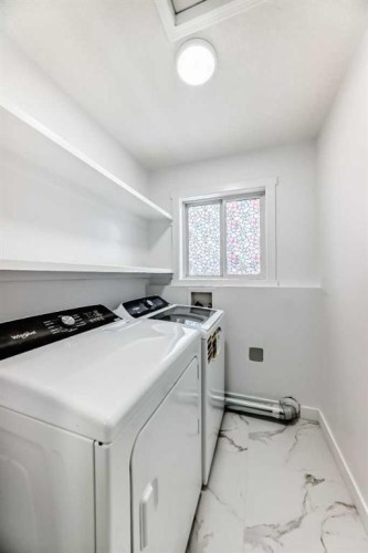 170 Country Hills Heights, Calgary, AB - Indoor Photo Showing Laundry Room