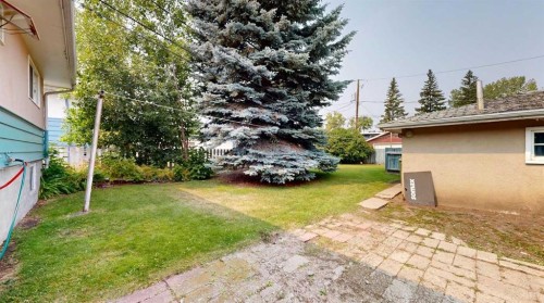 708 55 Avenue Sw, Calgary, AB - Outdoor