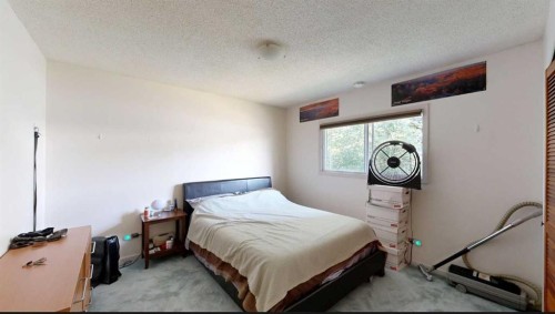 708 55 Avenue Sw, Calgary, AB - Indoor Photo Showing Bedroom