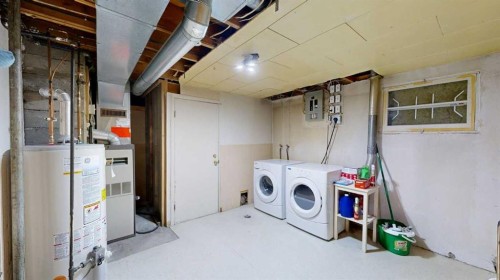 708 55 Avenue Sw, Calgary, AB - Indoor Photo Showing Laundry Room