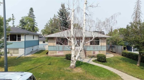 708 55 Avenue Sw, Calgary, AB - Outdoor