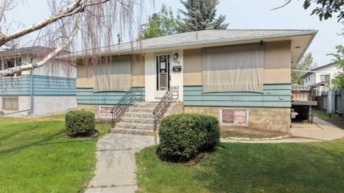 708 55 Avenue Sw, Calgary, AB - Outdoor