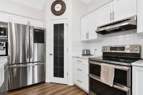 168 West Springs Close Sw, Calgary, AB - Indoor Photo Showing Kitchen With Stainless Steel Kitchen With Upgraded Kitchen