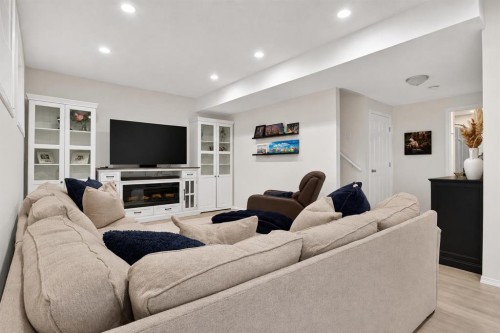 168 West Springs Close Sw, Calgary, AB - Indoor Photo Showing Living Room