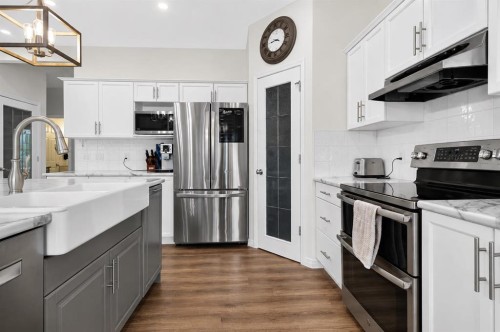168 West Springs Close Sw, Calgary, AB - Indoor Photo Showing Kitchen With Stainless Steel Kitchen With Upgraded Kitchen