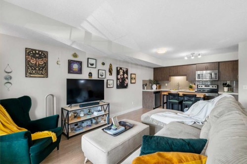 1205-250 Sage Valley Road Nw, Calgary, AB - Indoor Photo Showing Living Room