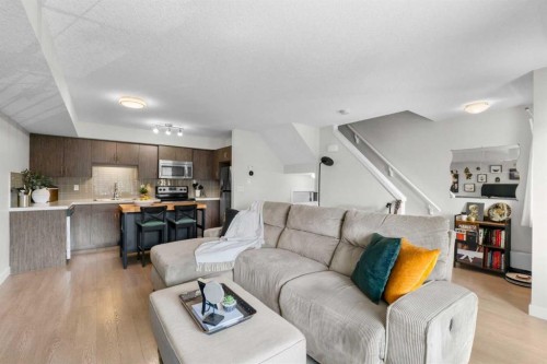 1205-250 Sage Valley Road Nw, Calgary, AB - Indoor Photo Showing Living Room