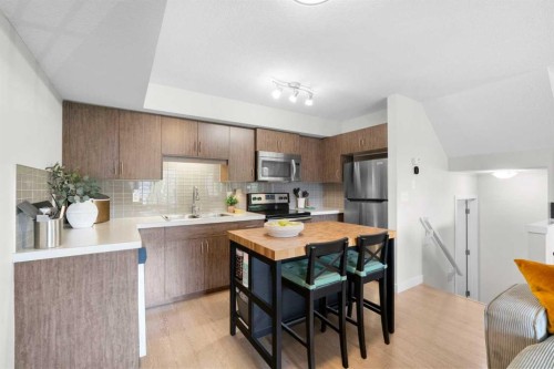 1205-250 Sage Valley Road Nw, Calgary, AB - Indoor Photo Showing Kitchen With Stainless Steel Kitchen