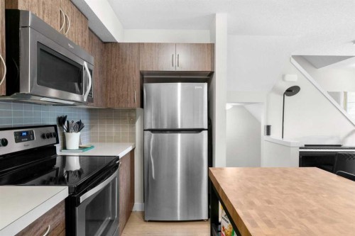 1205-250 Sage Valley Road Nw, Calgary, AB - Indoor Photo Showing Kitchen With Stainless Steel Kitchen
