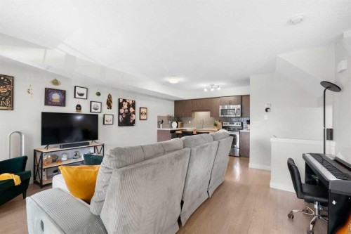 1205-250 Sage Valley Road Nw, Calgary, AB - Indoor Photo Showing Living Room
