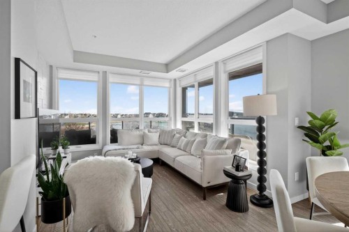 302-2231 Mahogany Boulevard Se, Calgary, AB - Indoor Photo Showing Living Room