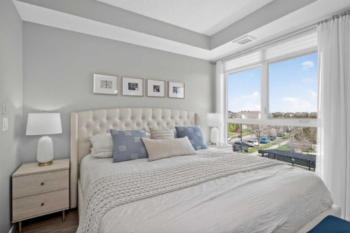 302-2231 Mahogany Boulevard Se, Calgary, AB - Indoor Photo Showing Bedroom