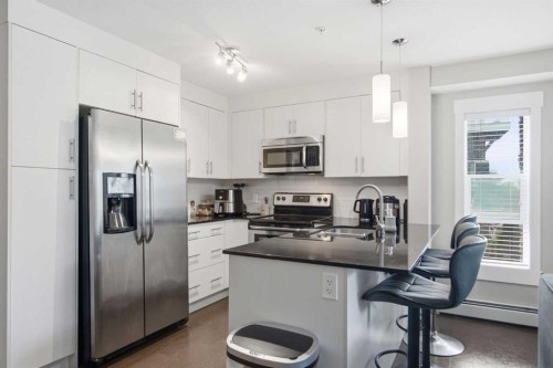 2206-240 Skyview Ranch Road Ne, Calgary, AB - Indoor Photo Showing Kitchen With Upgraded Kitchen