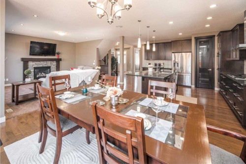 10 Aspenshire Place Sw, Calgary, AB - Indoor With Fireplace