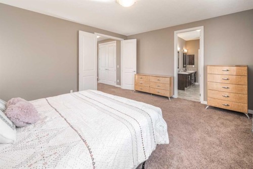 10 Aspenshire Place Sw, Calgary, AB - Indoor Photo Showing Bedroom