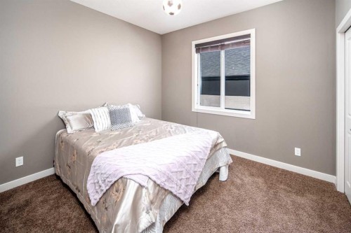 10 Aspenshire Place Sw, Calgary, AB - Indoor Photo Showing Bedroom
