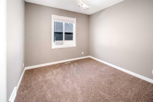 10 Aspenshire Place Sw, Calgary, AB - Indoor Photo Showing Other Room