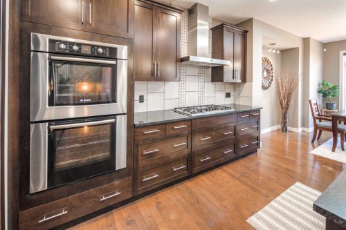 10 Aspenshire Place Sw, Calgary, AB - Indoor Photo Showing Kitchen With Stainless Steel Kitchen With Upgraded Kitchen