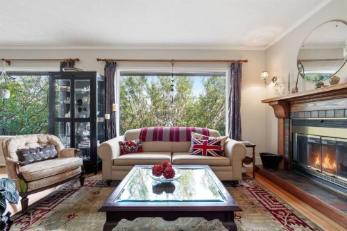 1909 21 Avenue Sw, Calgary, AB - Indoor Photo Showing Living Room With Fireplace