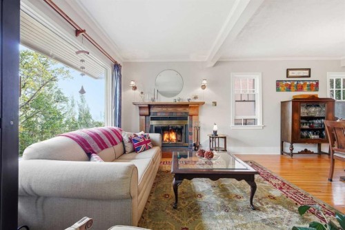 1909 21 Avenue Sw, Calgary, AB - Indoor Photo Showing Living Room With Fireplace
