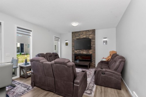 19 Cityline Heath Ne, Calgary, AB - Indoor Photo Showing Living Room With Fireplace