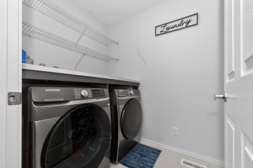 19 Cityline Heath Ne, Calgary, AB - Indoor Photo Showing Laundry Room