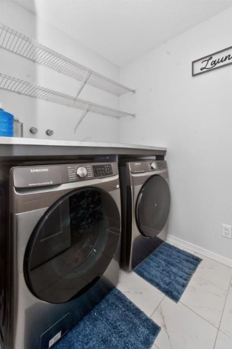 19 Cityline Heath Ne, Calgary, AB - Indoor Photo Showing Laundry Room