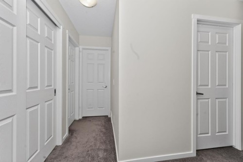 19 Cityline Heath Ne, Calgary, AB - Indoor Photo Showing Other Room
