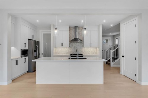 45 Carringsby Landing Nw, Calgary, AB - Indoor Photo Showing Kitchen With Upgraded Kitchen