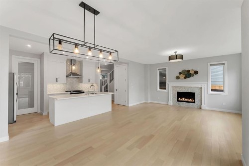 45 Carringsby Landing Nw, Calgary, AB - Indoor With Fireplace
