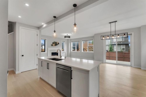 45 Carringsby Landing Nw, Calgary, AB - Indoor Photo Showing Kitchen With Double Sink With Upgraded Kitchen