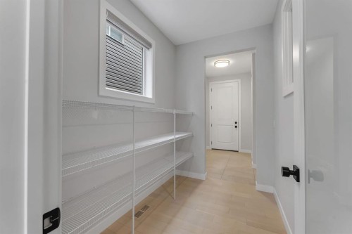 45 Carringsby Landing Nw, Calgary, AB - Indoor Photo Showing Other Room