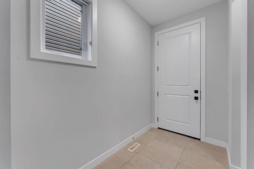 45 Carringsby Landing Nw, Calgary, AB - Indoor Photo Showing Other Room